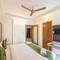 Отель Treebo WoodsVilla Suites