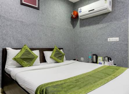 Отель Treebo Raya Inn