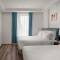 Отель Adaline Hotel & Suites