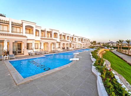 Отель Invidia Coral Beach Tiran