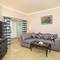 Отель Invidia Coral Beach Tiran