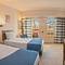 Отель Invidia Coral Beach Tiran