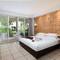 Отель Palm Beach Resort & Spa Sanya