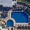 Отель Dionysos Hotel & Suites