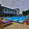 Отель The Blue Wave Hotel
