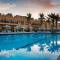 Отель Al Hamra Village Hotel