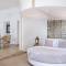 Отель Grecotel Mandola Rosa Suite & Villas