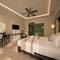 Отель Grand Signature Resort Hoi An by M Village