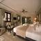 Отель Grand Signature Resort Hoi An by M Village