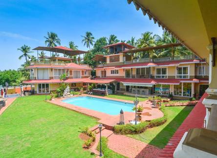 Отель Stone Wood Riverfront Resort, Siolim