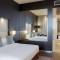 Отель The Boulevard Arjaan by Rotana
