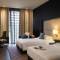 Отель The Boulevard Arjaan by Rotana