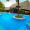 Отель Mnarani Beach Cottages