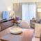 Отель Pullman Dubai Creek City Centre Residences