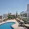 Отель The Royal Blue a Luxury Beach Resort