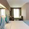 Отель Grand Ixora Kuta Resort