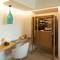 Отель Mitsis Rinela Beach Resort & Spa
