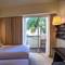 Отель The Akmani Legian Boutique Hotel