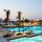 Отель Porto Platanias Village Resort