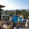 Отель Koni Village Hotel Apartments