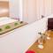 Отель Oktober Downtown Boutique Hotel