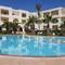 Отель Calimera Delfino Beach Resort & Spa