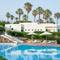 Отель Calimera Delfino Beach Resort & Spa