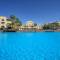 Отель Grand Tala Bay Resort