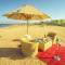 Отель Grand Tala Bay Resort
