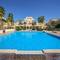 Отель Grand Tala Bay Resort