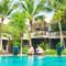 Отель Ravenala Boutique Resort