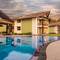 Отель Caltura Beach Villa