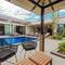 Отель CasaBay Luxury Pool Villas
