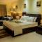 Отель Oasis Hotel Restaurant & Spa