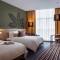 Отель Downtown Rotana