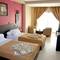 Отель Suite Hotel Tilila