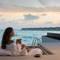 Отель Kuredhivaru Resort and Spa