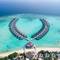 Отель Kuredhivaru Resort and Spa