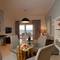 Отель Pictures Suites