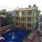 Отель Larios Beach Holidays