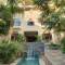 Отель The House Boutique Suites