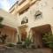 Отель The House Boutique Suites