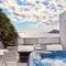 Отель Royal Myconian - Leading Hotels of the World