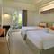 Отель HARRIS Hotel & Residences Sunset Road