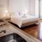 Отель GS Chiado Boutique Studios & Suites
