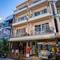 Отель Grand Orchid Inn