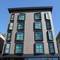 Отель Upsuites Hotel