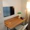 Отель Upsuites Hotel