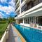 Отель The Lago Apartments by TropicLook