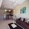 Отель The Lago Apartments by TropicLook